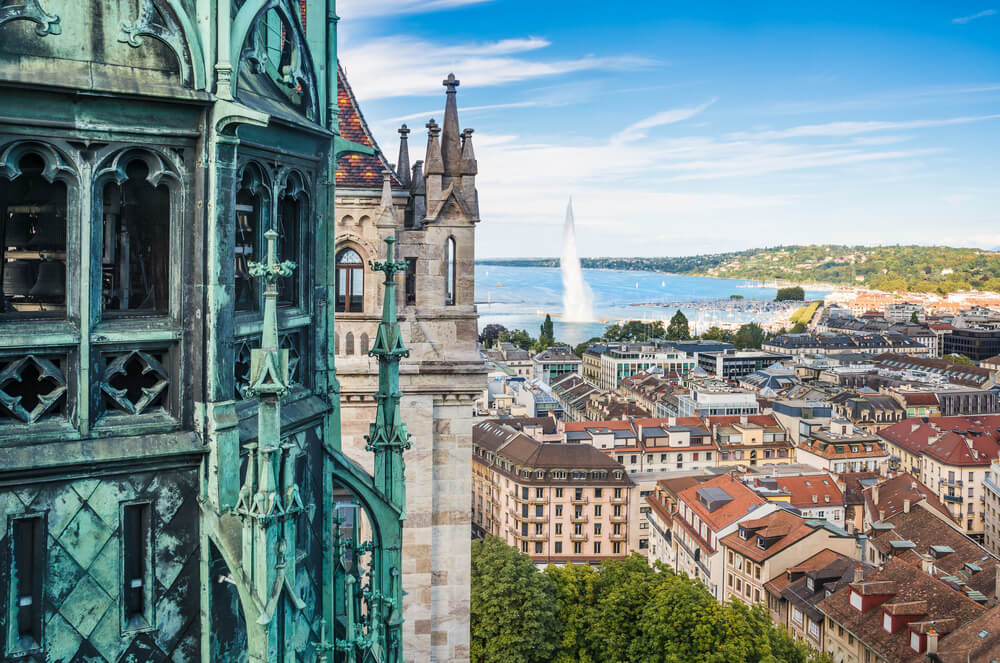 View of Geneva from the height of the Cathedral of Saint-Pierre, Switzerland, with the famous Geneva fountain visible in the distance