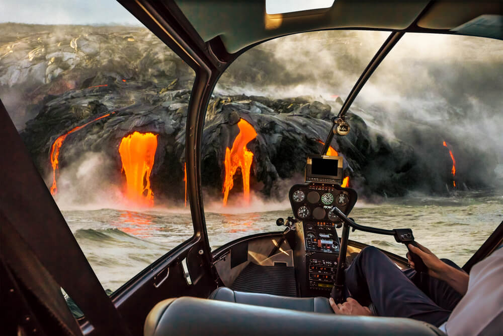 Helicopter zooming in to show the volcano flows on Hawaii