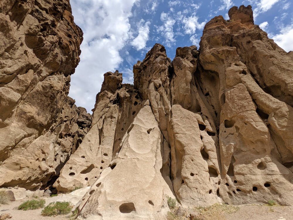 holes in the canyon walls on a popular mojave national preserve hike