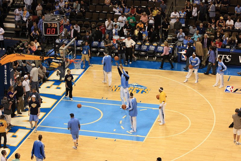 Basketball players at the arena playing a game