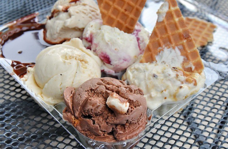 Several scoops of Ice cream served in a tray