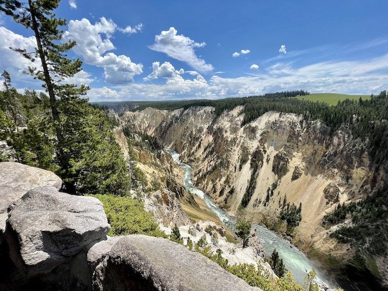 looking towards the grand canyon of the yellowstone large river with steep canyon walls