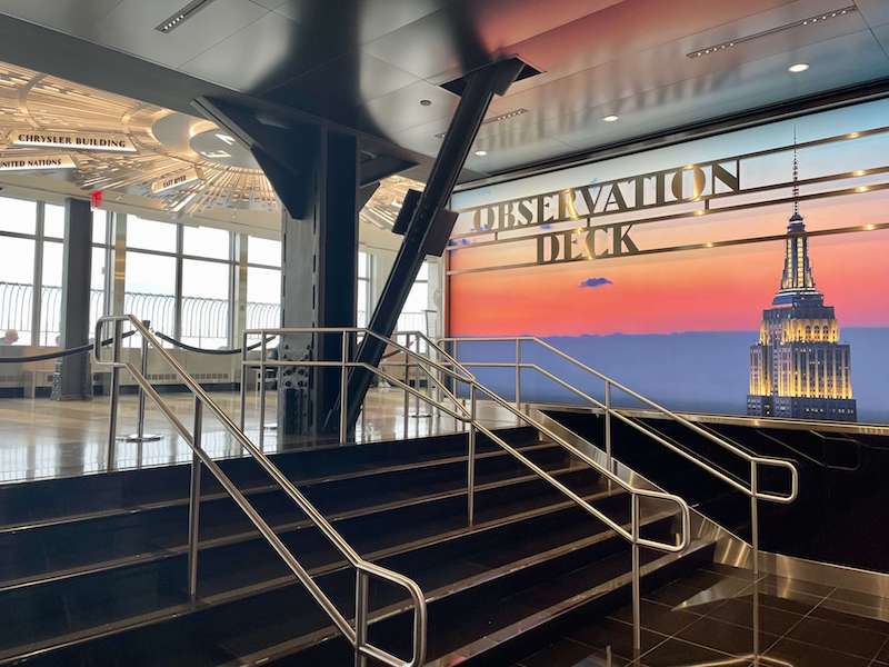 leading up to the observation deck at the empire state building stairs and windows