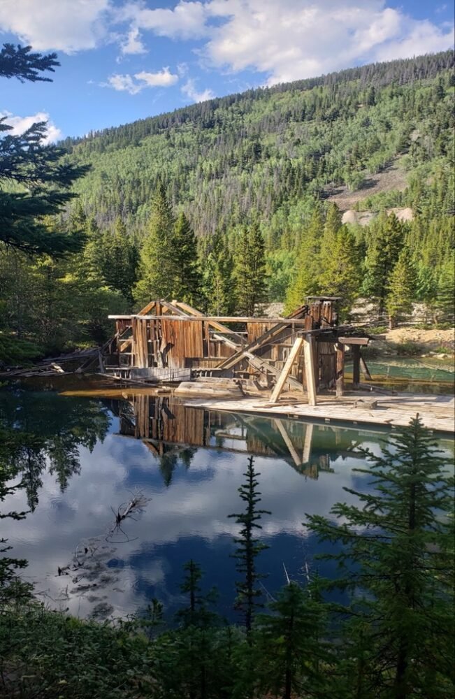The remains of an old mine by the water in Breckenridge Colorado