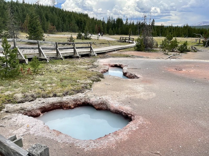 baby blue geysers in yellowstone and boardwalk