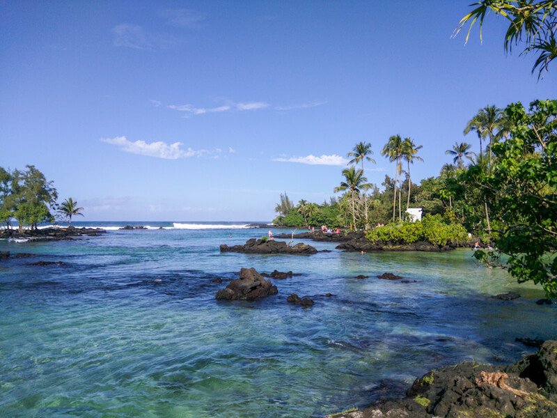 the turquoise waters of Carlsmith beach park is one of best places to swim and snorkel close to Hilo. 