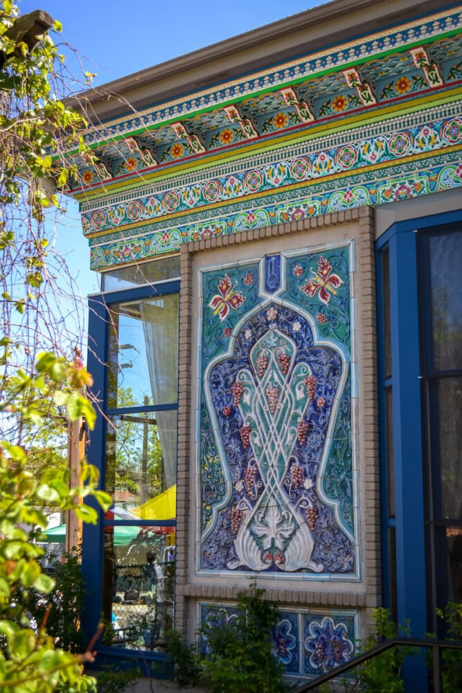 intricate detailing on the dushanbe tea house in boulder with teal and blue and pink detail