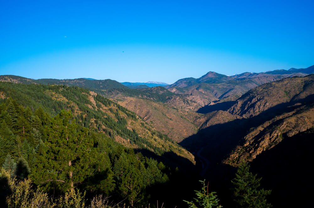 Views of Rocky Mountain foothills near Golden Colorado on the Chimney Gulch Trail on a sunny, cloudless day