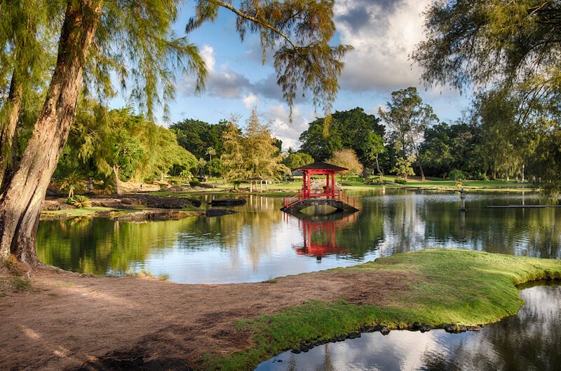 Red japanese pagoda in the middle of the hilo gardens