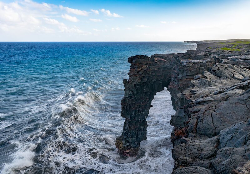 Sea arch made from cooled lava from a lava flow in Hawaii Volcanoes National Park