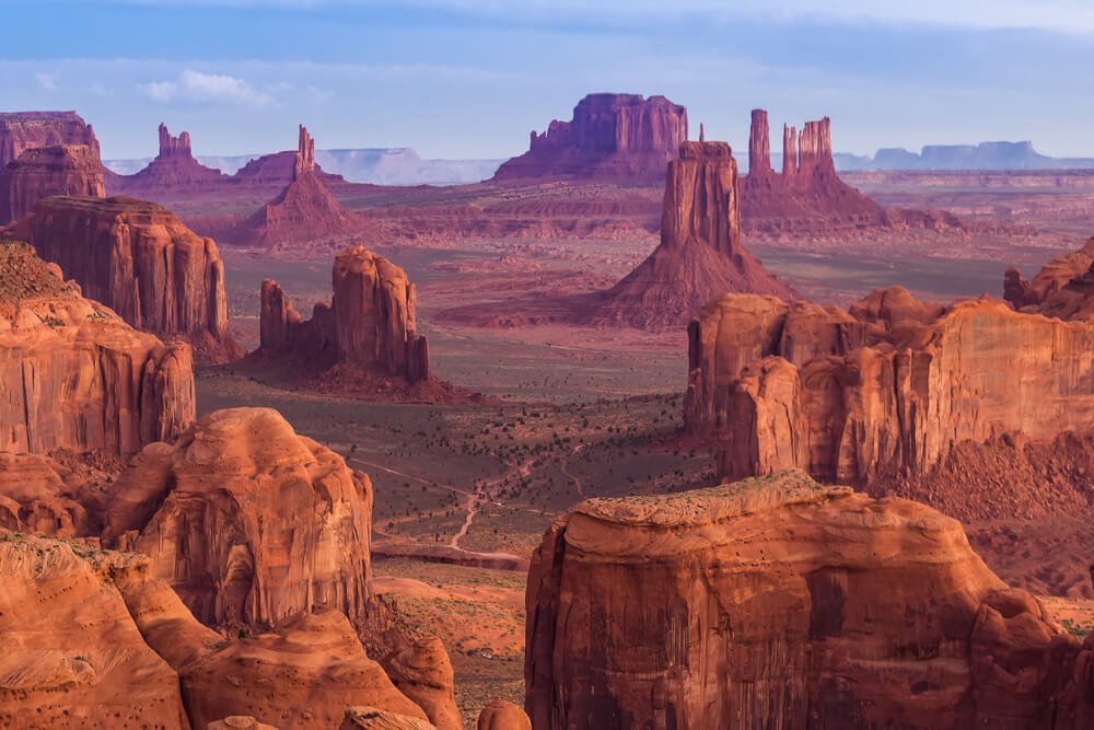 purple and reddish mesas at hunts mesa in monument valley