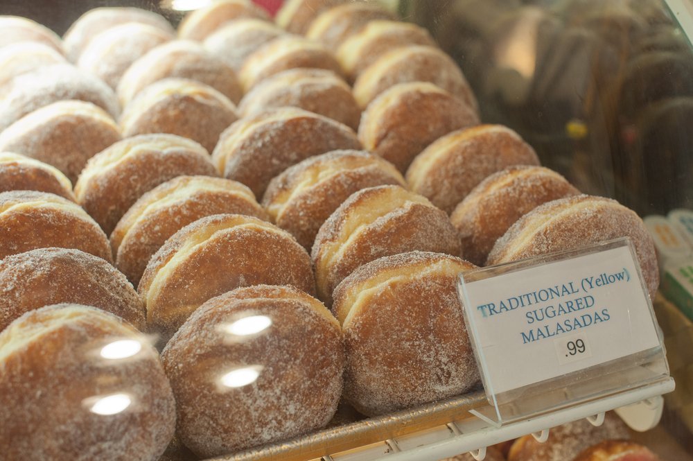 traditional portuguese donuts covered in sugar