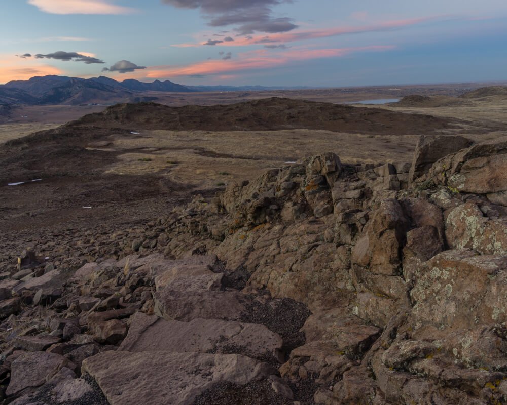 Sunset hitting different rock formations on a hike on North Table Mountain Golden Colorado