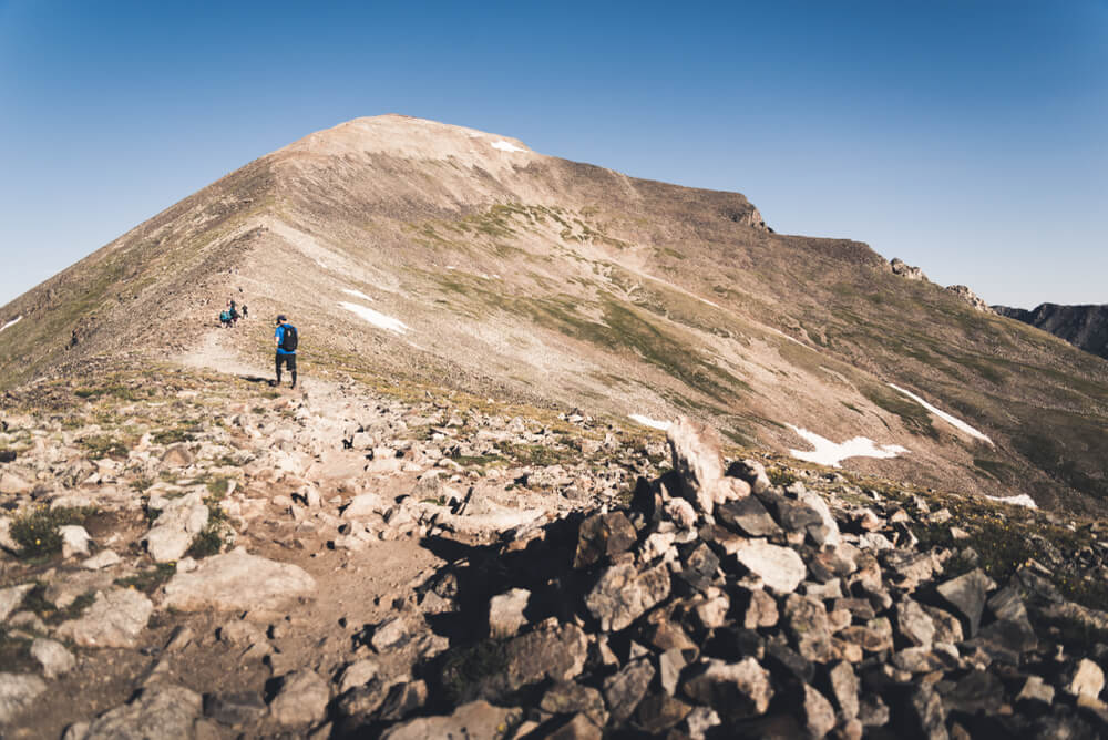 People hiking up the steep section of Quandary Peak in Colorado near Breckenridge hiking spots