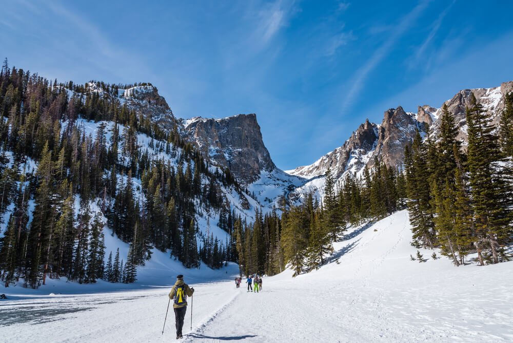 Crossing the frozen surface of Dream Lake in Rocky Mountain National Park, Colorado.
