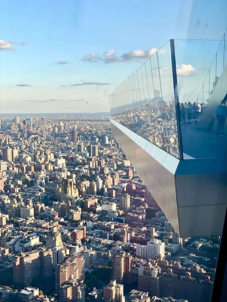 View of The Edge Observation Deck jutting out from the building as a sky deck on a sunny day in New york city