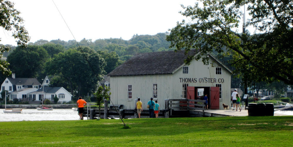 restaurant that reads thomas oyster co on the water