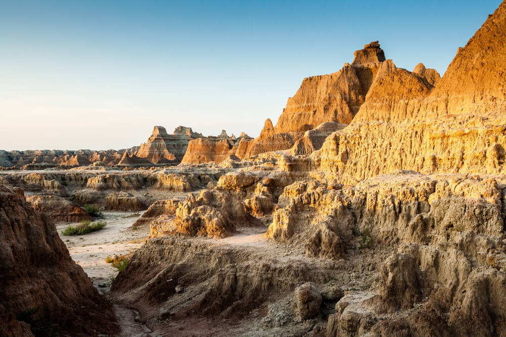 Sunrise falling on a rock formation near the Door Trail in Badlands National Park