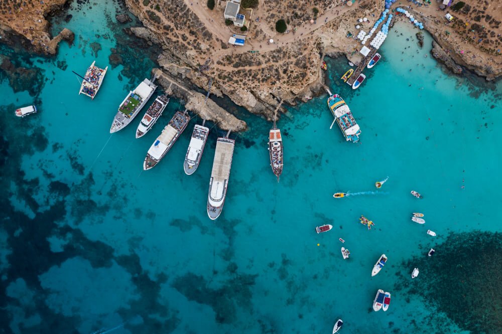 Aerial shot of beautiful turquoise Blue Lagoon Comino Gozo Malta
