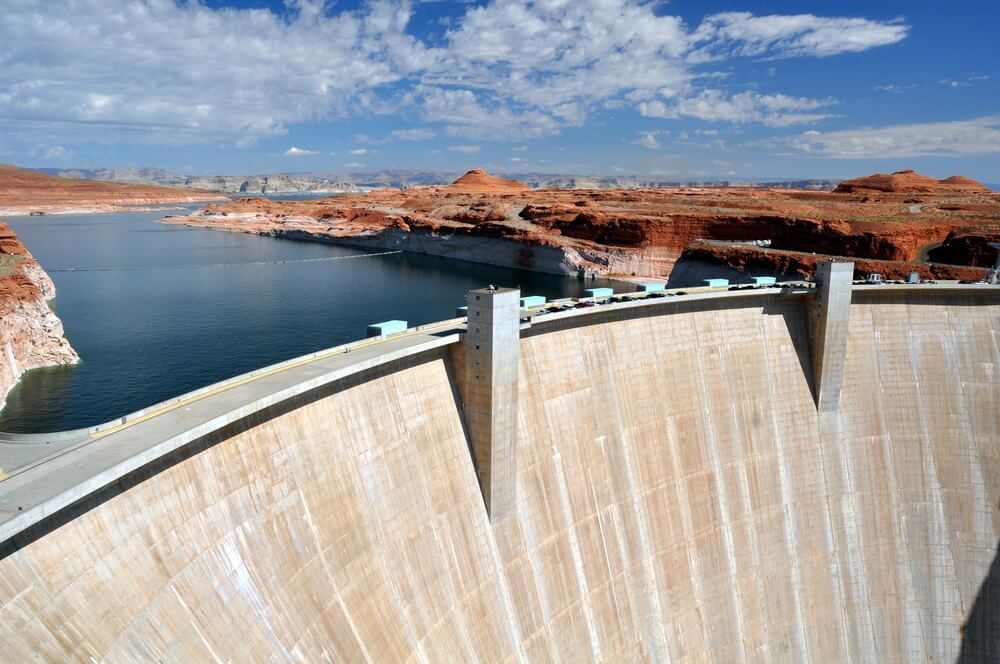 the giant dam at the hoover dam, holding in water from lake mead, near the border of arizona and nevada
