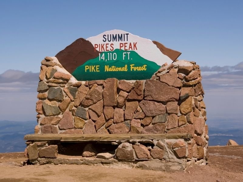 rock sign at the pike peak summit at over 14000 feet in colorado