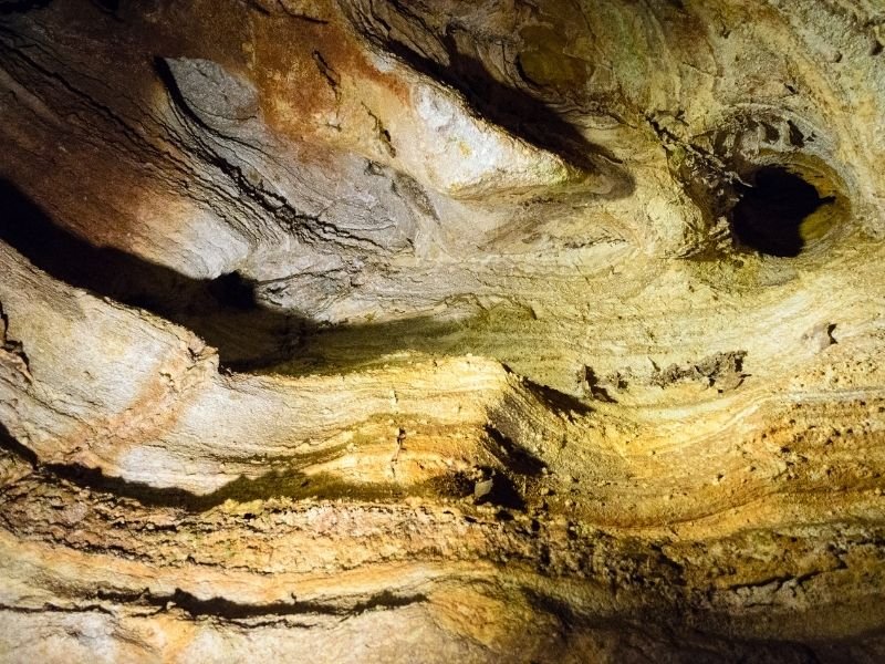 inside one of the caves at wind cave national park. sedimentary rock layers in the cave.