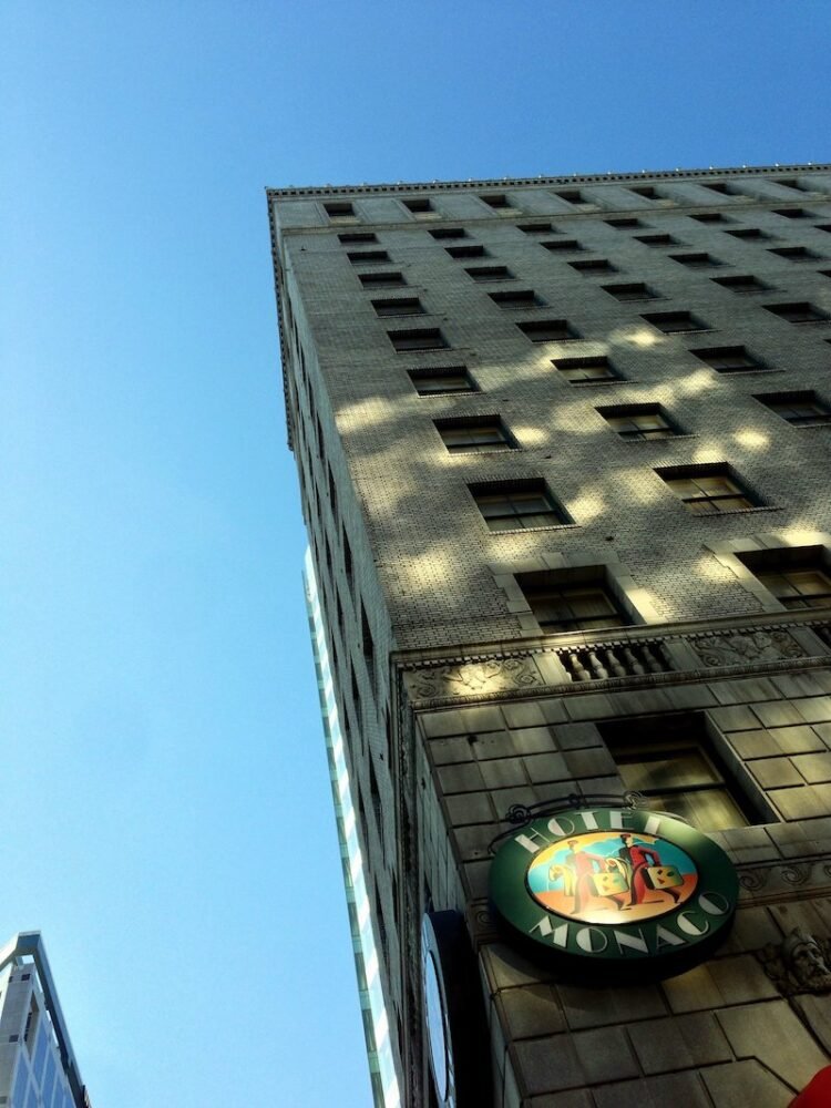 facade of a historic hotel building hotel monaco in downtown slc