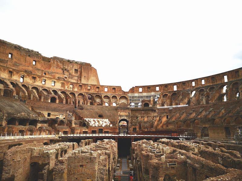 Interior view of the Roman Colosseum including the basement level ruins and the stadium around it