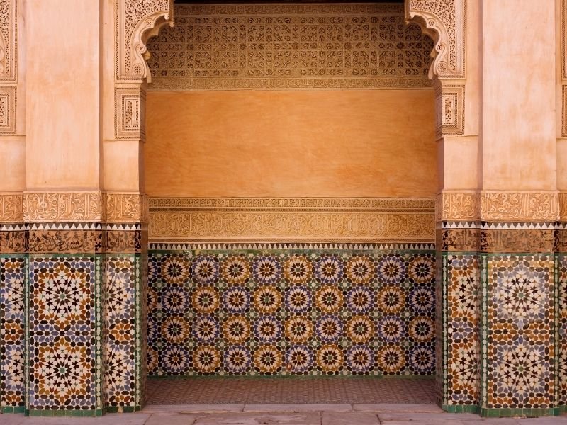 the ornate tilework at the ben youssef madrasa a must on a marrakech itinerary