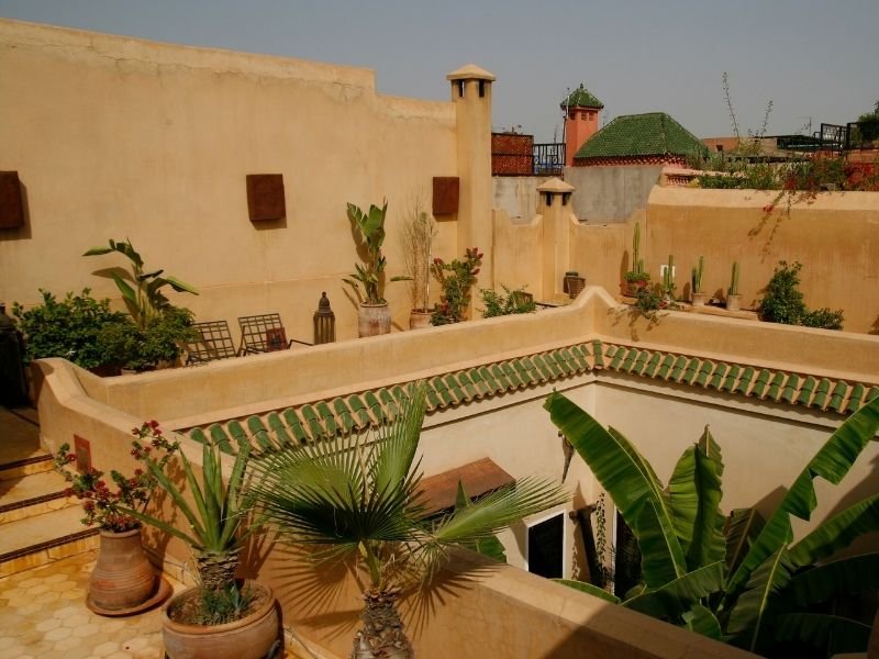 the rooftop courtyard of a cute and chic marrakech riad