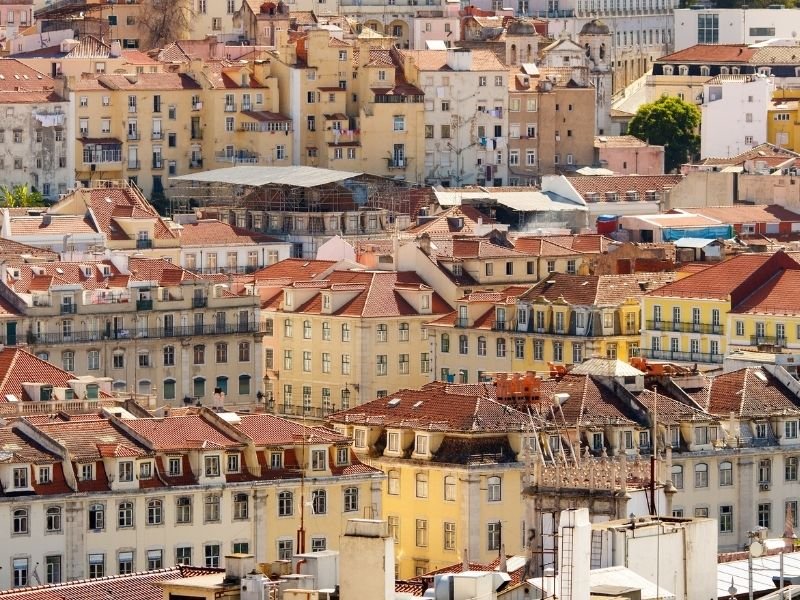 buildings in the low-lying baixa district of lisbon, one of the top places to stay in lisbon