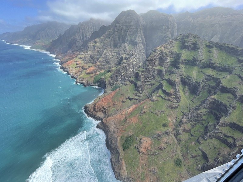 The beautiful vibrant Na Pali Coast seen from a helicopter tour over Kauai
