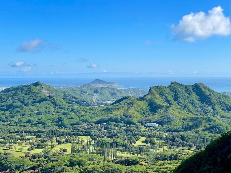 view of the nu'uanu pali lookout overlooking the mountains, windward coast, and islands off the coast of oahu