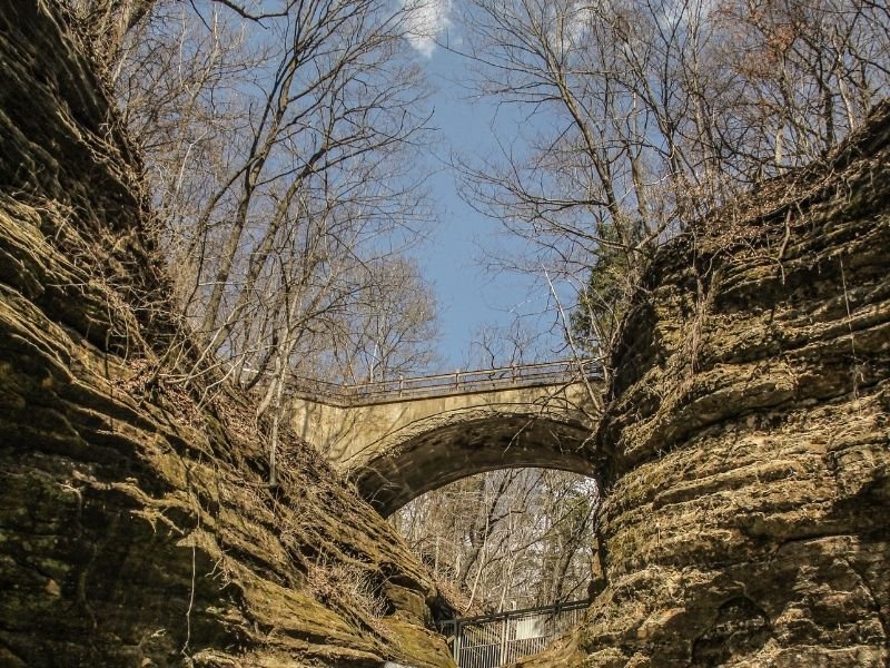 bridge over a waterfall in a state park in illinois near oglesby