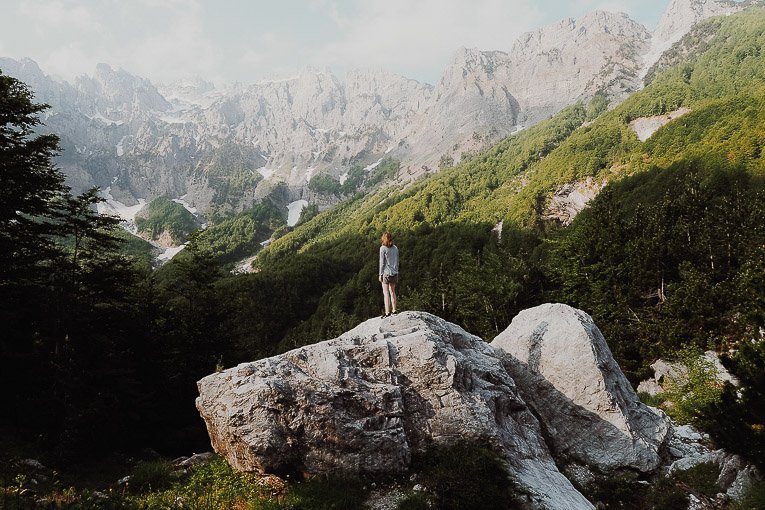 Emily lush on a hike in Albania using Peak Visor to identify peaks in the distance