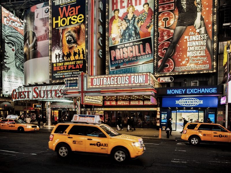 taxis in front of broadway theaters in nyc