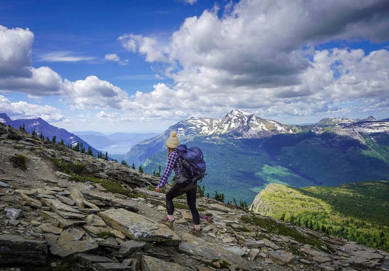 traveler Jessica using the cairn app for hiking safety while traveling in the mountain backcountry