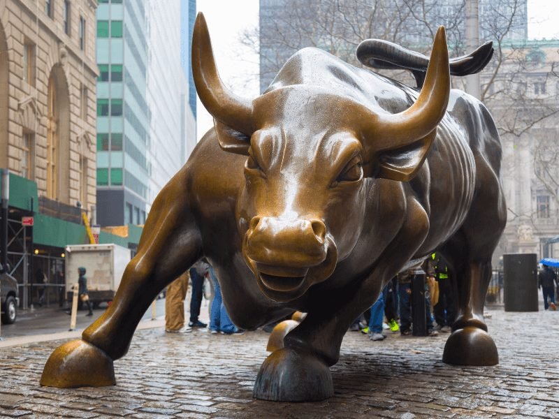 famous charging bull statue which is a symbol of wall street and new york city's financial district