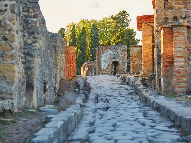 the pathway through the ruins of pompeii in italy