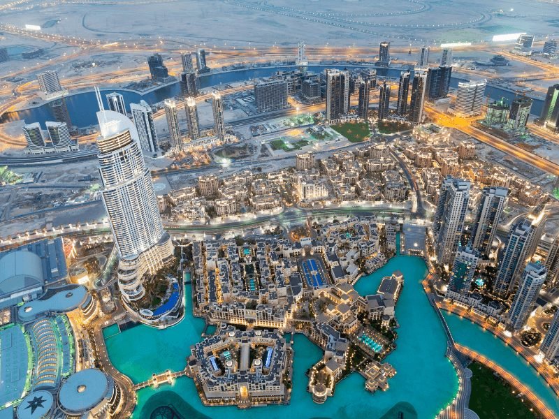 view of the dubai fountain as seen from above on one of the floors of the burj khalifa