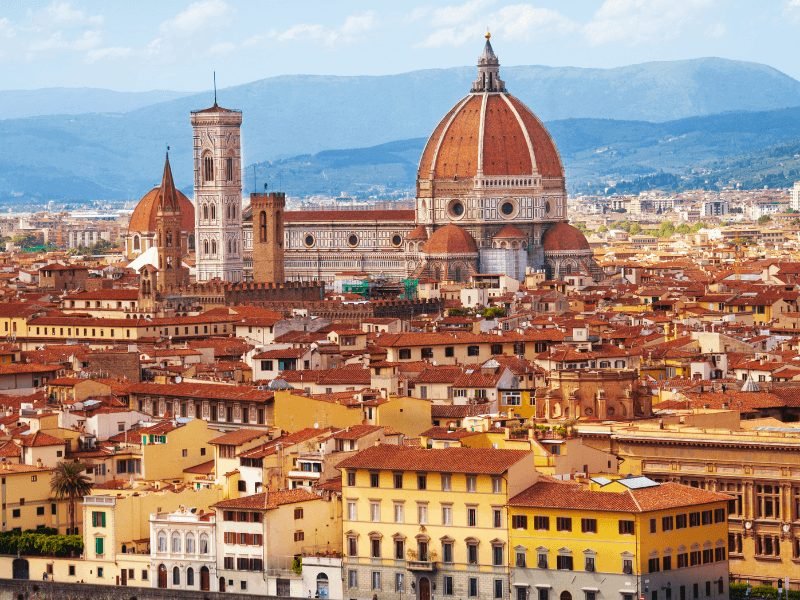 The beautiful city of Florence as seen from across the river at a popular viewpoint with the Duomo dominating the skyline