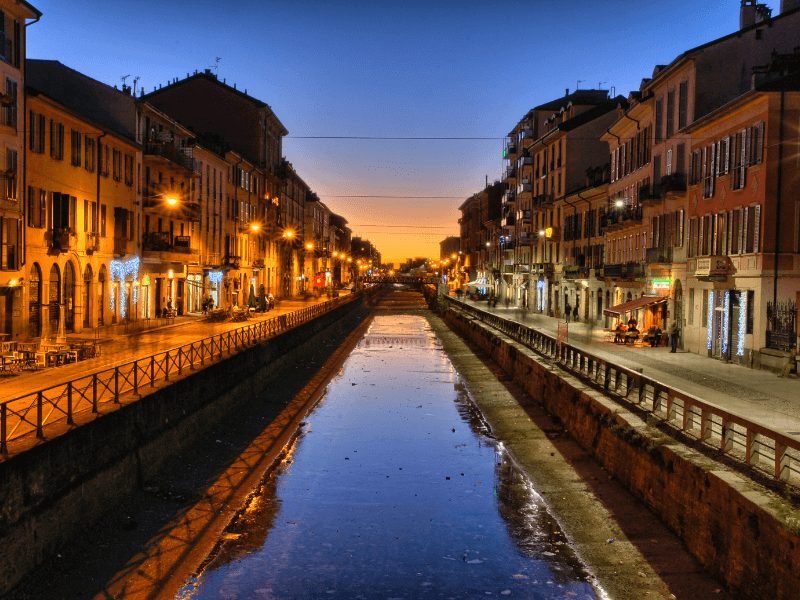 evening in the navigli area with sun already set and lights on