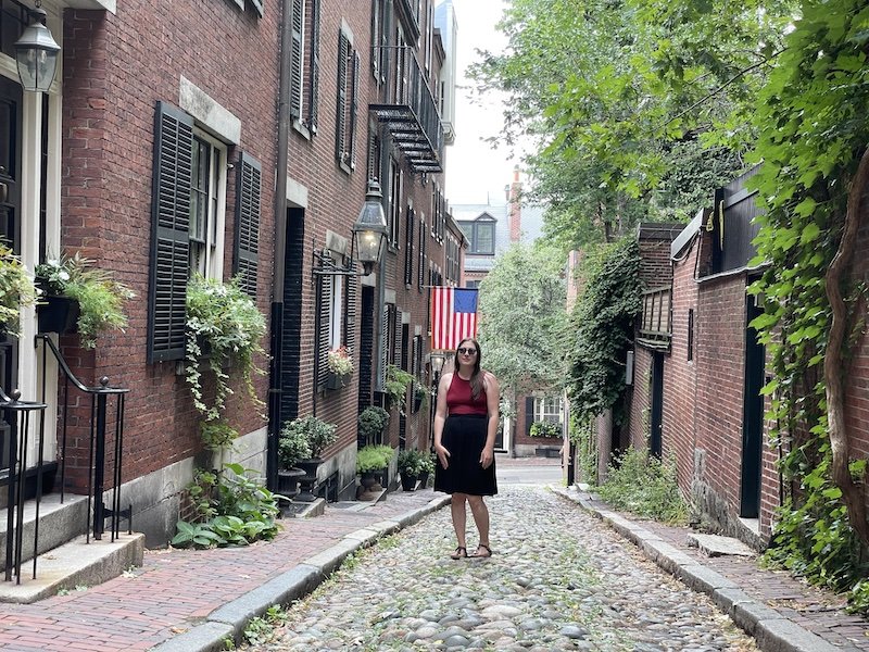 Allison walking around Beacon Hill on Acorn street