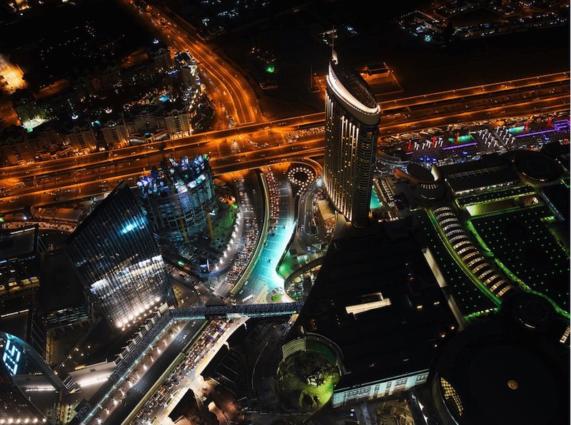 view as seen from the top of the burj khalifa at night in dubai