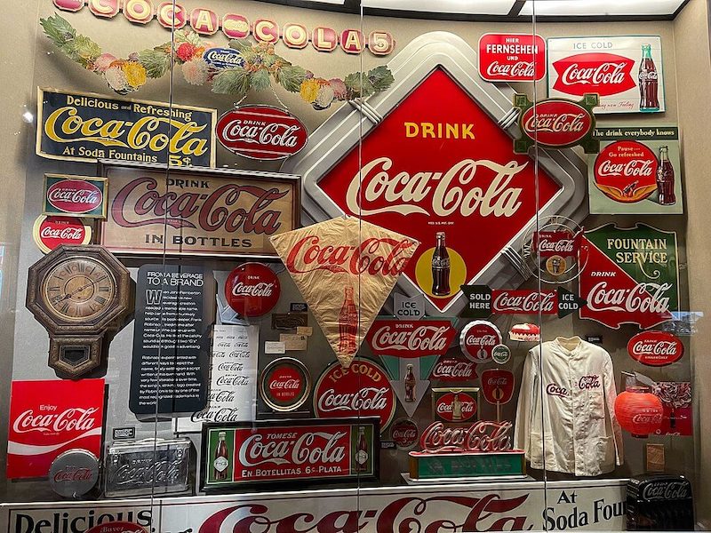 various red and white coca cola memorabilia from the 20th century