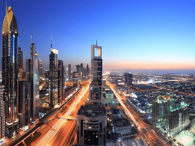 view as the sun sets in dubai at night