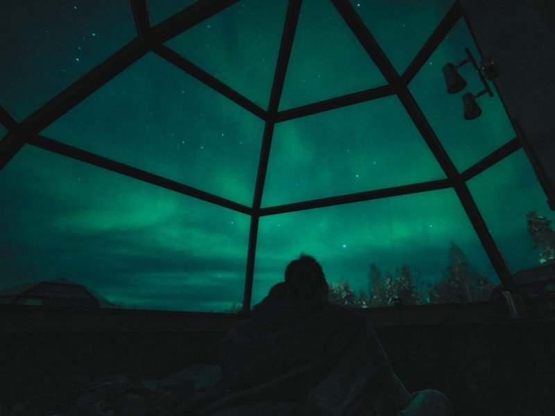 view from the interior of a glass igloo in finland