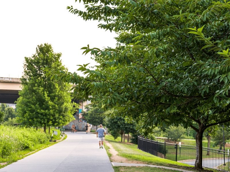 the beltline in atlanta with a few people walking on it