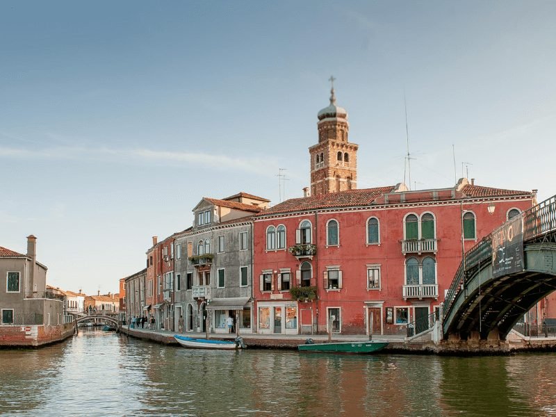 bridge and buildings in murano island part of venetian lagoon area