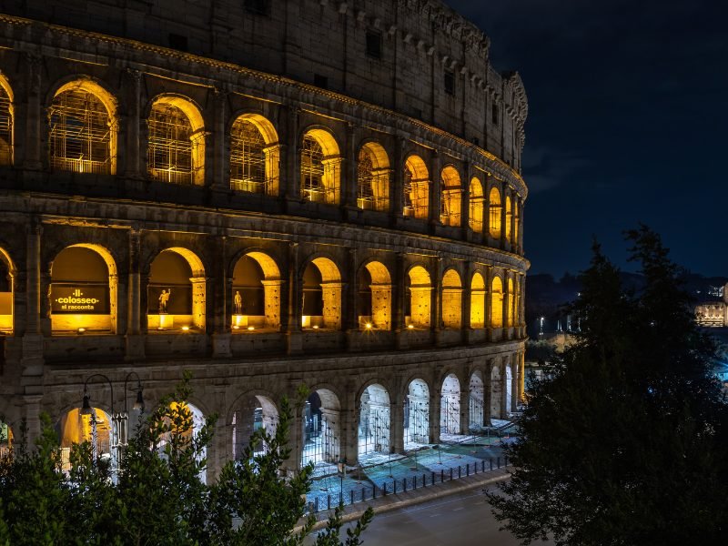 the exterior of the colosseum as seen at night - yes you can visit at night!